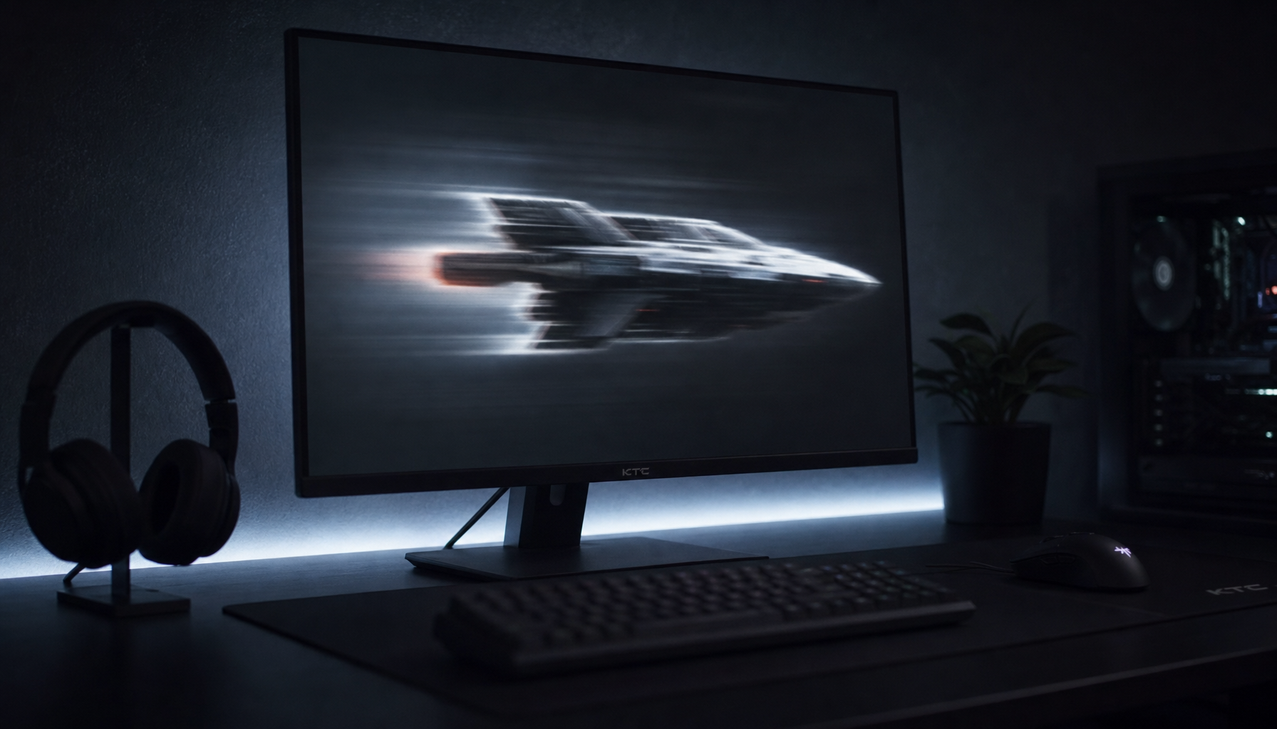 Gaming monitor showing response time overshoot artifact — pale halos along dark moving edges in a dimly lit gaming setup