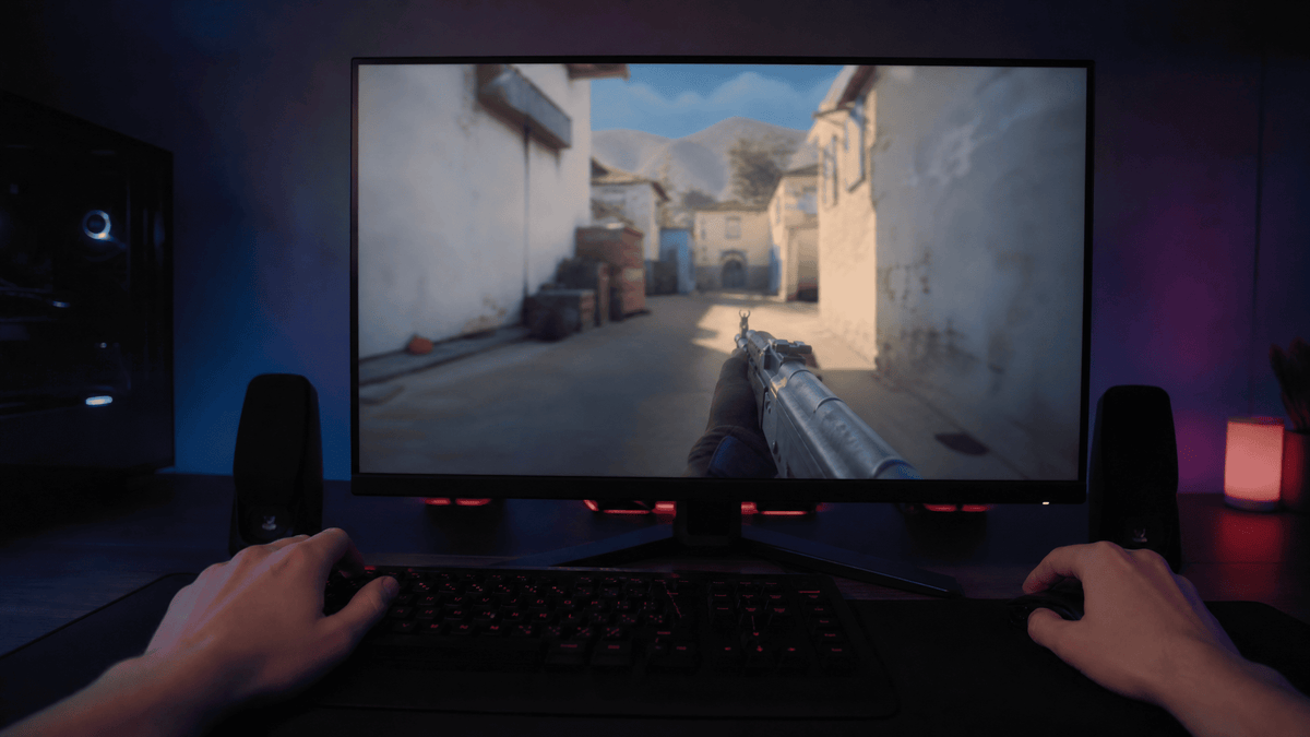 KTC gaming and productivity monitors in multiple sizes arranged on a modern desk to show size comparison