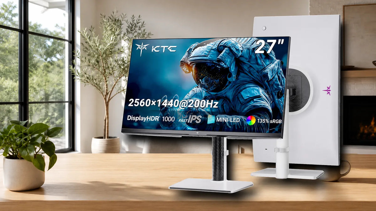 KTC M27T6S Mini LED monitor shown from the rear with its full chassis and stand in a bright room workstation scene